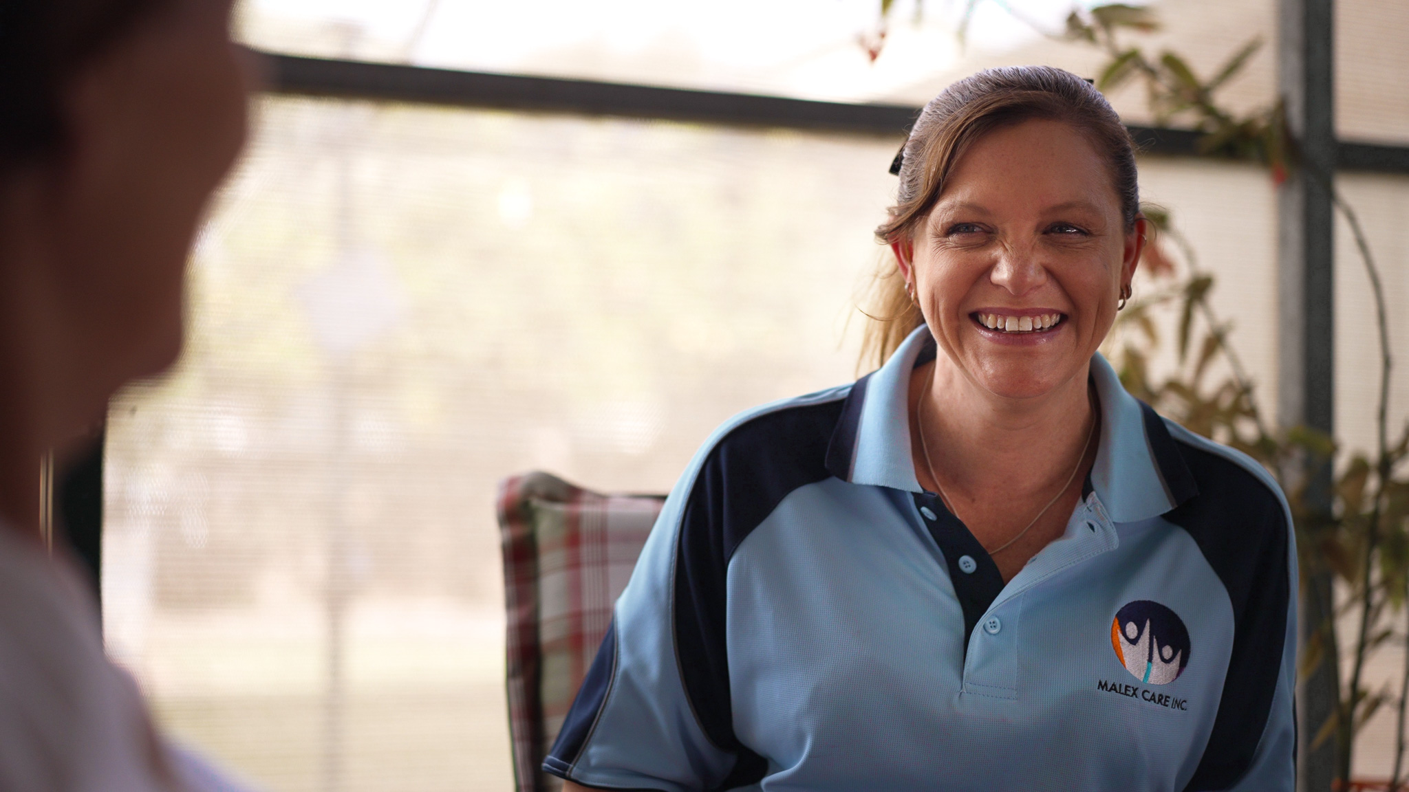 Malex Care Support Worker providing in-home care to clients in Adelaide
